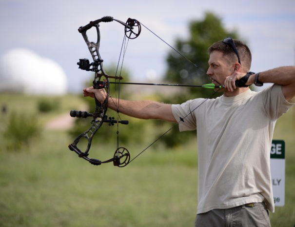 SCHRIEVER AIR FORCE BASE, Colo. – Tim Paget takes aim during an archery competition held on base Aug. 23.  Paget beat out 11 other competitors to take first place after two rounds of sharp shooting. (U.S. Air Force photo/Christopher DeWitt)